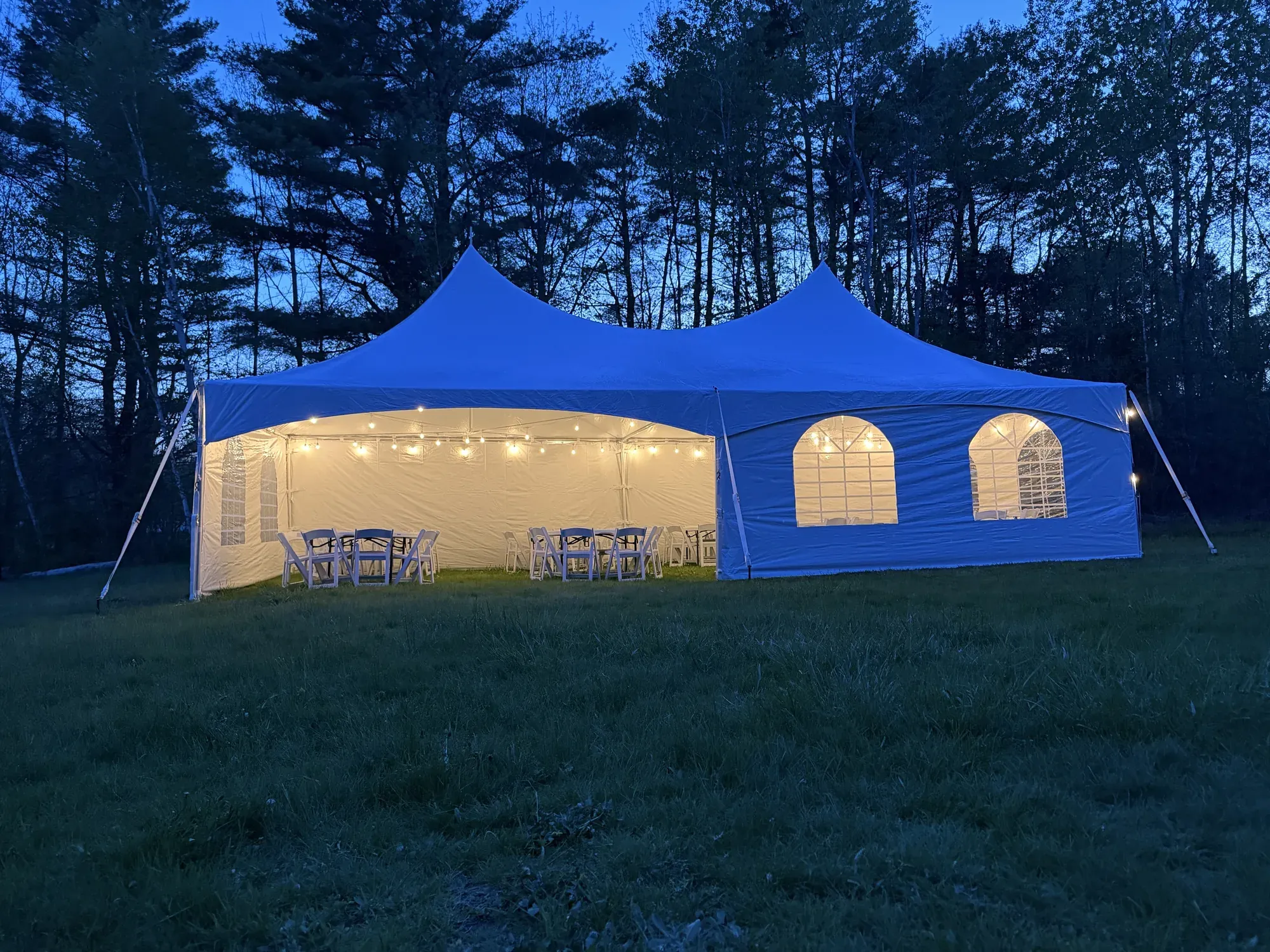 Event Rent ME tent lit for an evening celebration
